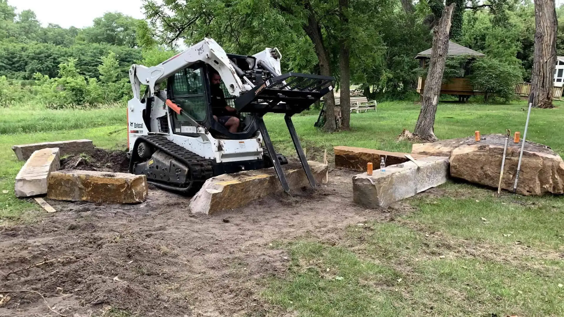 Michalski Employee Moving Large Stones